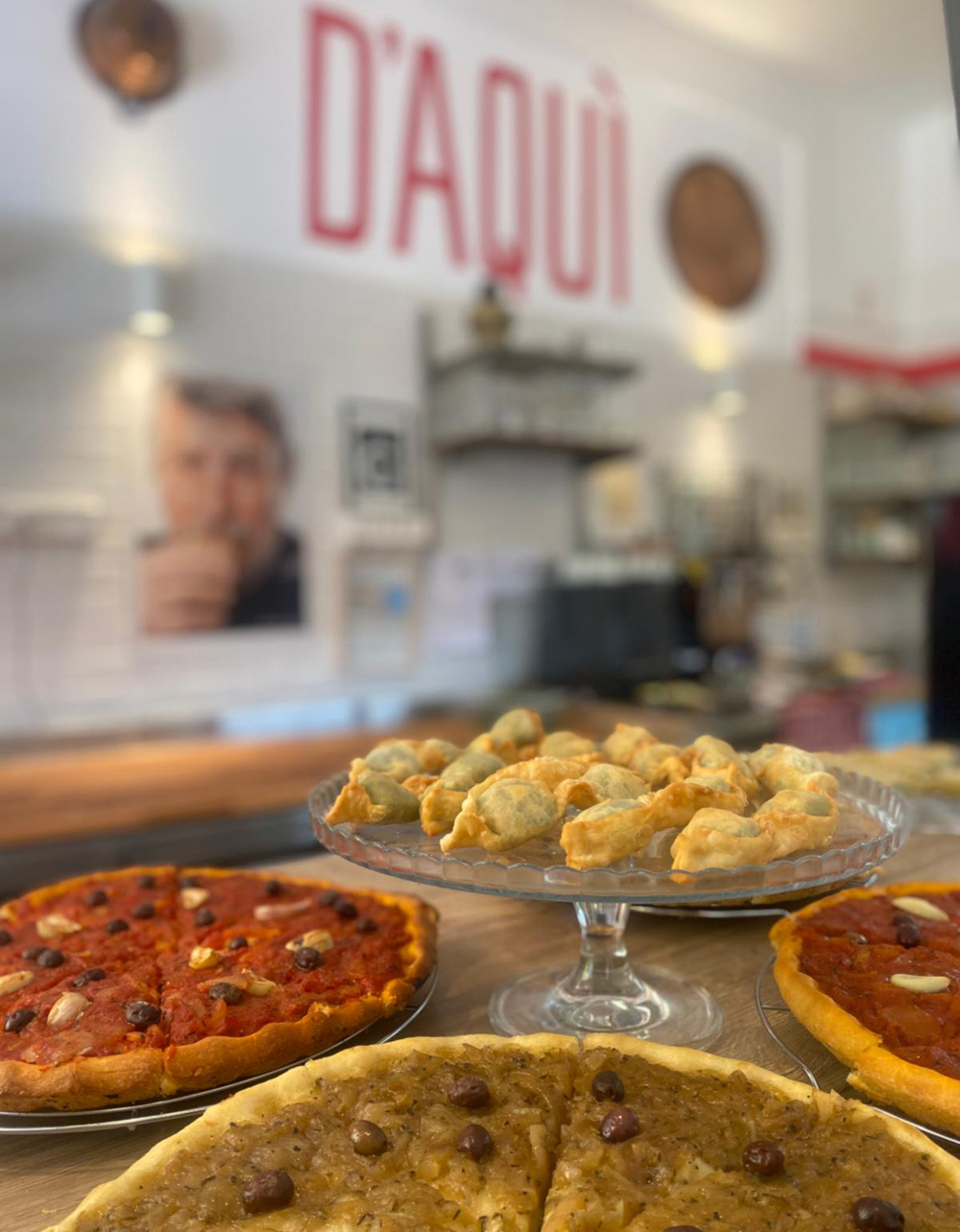 Barbajuans, pizza, and pizzaladière from the D'AQUÌ restaurant